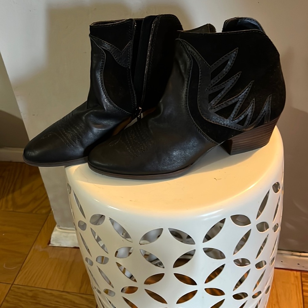 Black leather upper booties.